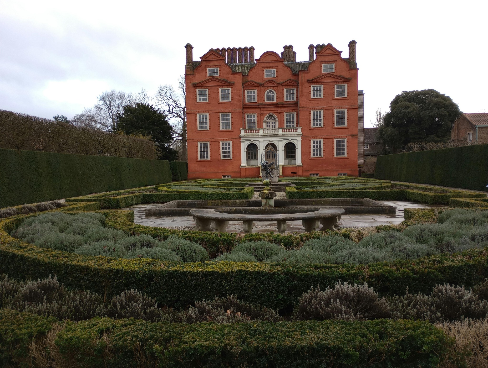Formal garden and historic red house